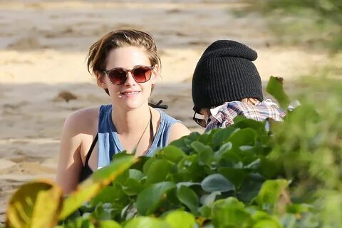 Kristen Stewart in bikini top and shorts making out with som