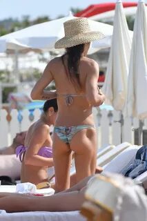 Maggie Q sexy ass in a thong bikini at the beach seen by pap