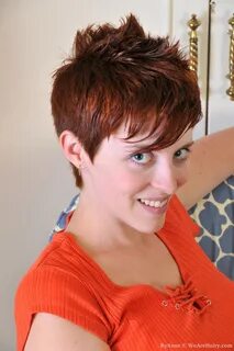 Short haired RyAnne bends over and gives view to her bush - 