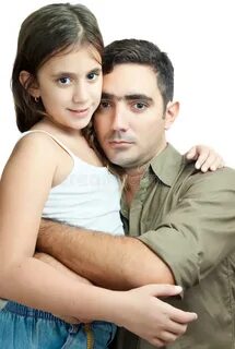 Young Latin Father Hugging His Daughter Photos - Free & Roya