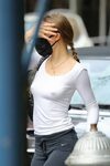 Lily-Rose Depp Goes braless as she leaves for the airport in