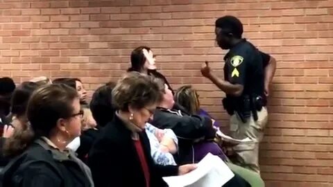 Teacher handcuffed after speaking out at meeting, caught on 