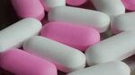 medicine drugs white pink pills turning: стоковое видео (без
