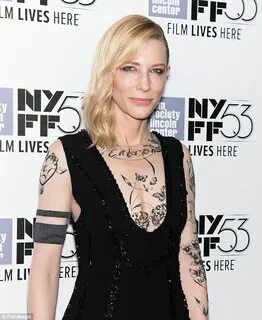 Cate Blanchett sports dress with tattoo sleeves at Carol pre