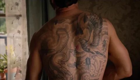 You can see the exit wound in the middle of Kevin's tattoo -