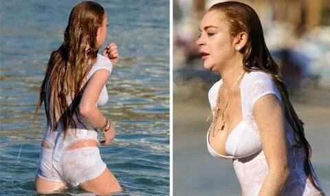 Lindsay Lohan struggles to contain her bust as she frolics i