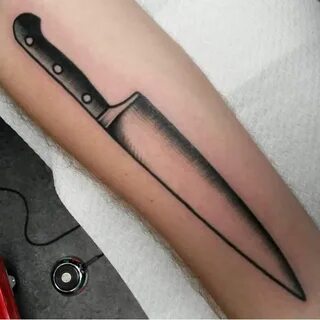 Straight lines chef’s knife tattoo on the arm by Jeroen Van Dijk.