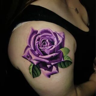 Purple rose boob tattoo