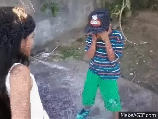 Girl kicks boy in the balls on Make a GIF