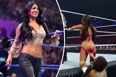 WWE Diva exposes bare bum when knickers get pulled down duri