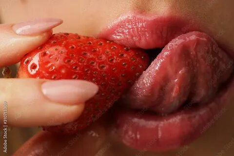Sexy lips with strawberries. 