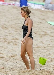 Natalie Bassingthwaighte flaunts figure in bathing suit Expr