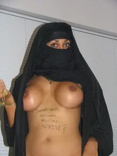 Arab Chick With AK-47 Stripping Out Of Her Burka And Showing
