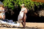 Hilary duff showing off her curvy bikini body at a beach Hol