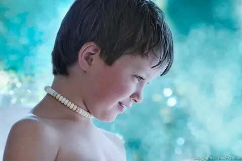 Model released close up of young boy with candy necklace