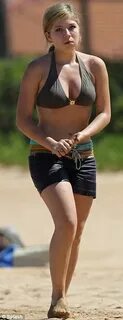 Jennette McCurdy displays her curves in a grey bikini as she