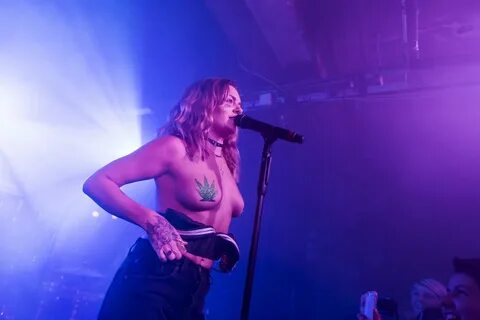 Tove Lo topless wearing pasties while performing during a sp