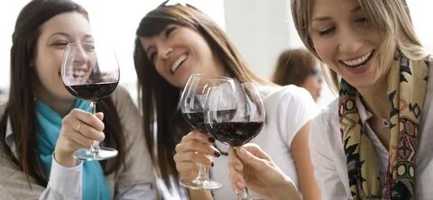 women-drinking-wine - REYES WINERY