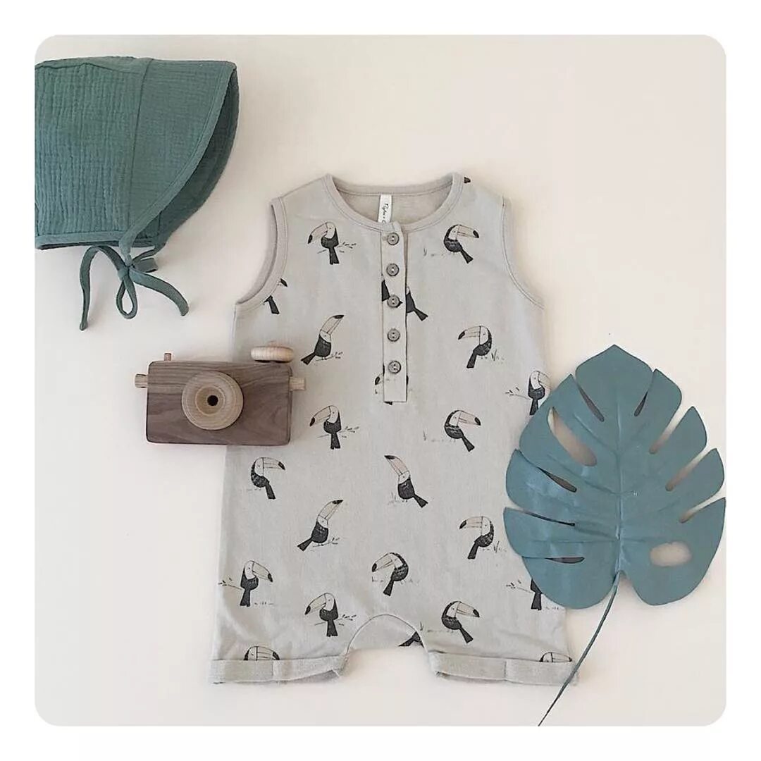 Super soft lightweight french terry romper with the prettiest all over touc...