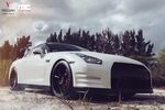 Aggressive Face of White Nissan GT-R Boasting Blacked Out Gr