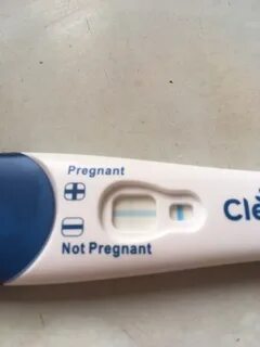 very faint line clear blue pregnancy test - Captions Swap