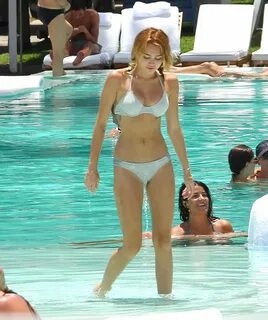 Miley Cyrus showed off her bikini body in Miami. Miley Cyrus