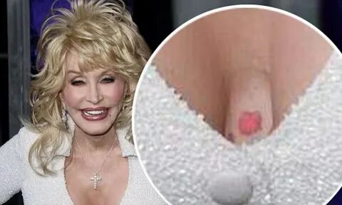 Dolly Parton's breasts and arms 'secretly covered in tattoos