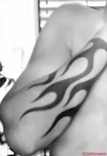 Black Ink Greek Tattoo On Forearm