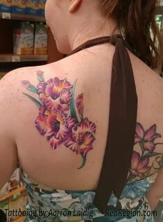 Colorful gladiolus tattoo. The birth flower of August is the
