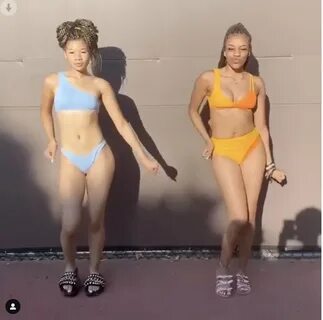 Storm Reid Wearing a Light-Blue Frankies Bikinis Swimsuit PO