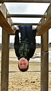 Little Boy Swinging Monkey Bars Photos - Free & Royalty-Free