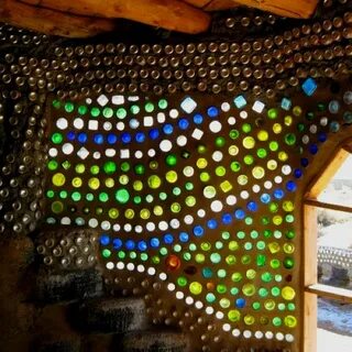 Earth ships with wall of upcycled bottles Earthship home, Ea