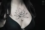 Татуировка на груди у девушки - лилия - KissMyTattoo.ru