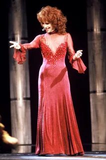 Reba McEntire wore her 1993 red dress. 