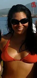 NEW! Sara Ramirez soaking up the sun in her red bikini. Sara