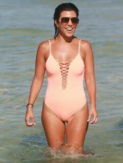 KOURTNEY KARDASHIAN in Swimsuit oat a Beach in Miami 09/17/2