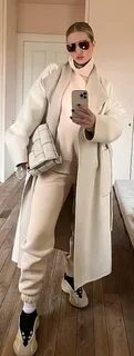 Who made Rosie Huntington-Whiteley’s white woven handbag, sneakers, white socks,