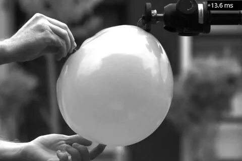 Balloon popping in slow motion (10000 FPS) - YouTube