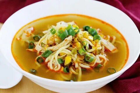 Chicken soup with noodles in Asian style