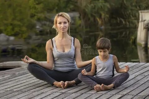 Mother and Son Exercising Yoga Pose Stock Photo - Image of m