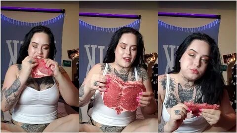 Woman eats a raw heart-shaped steak. Happy Valentine's Day, 