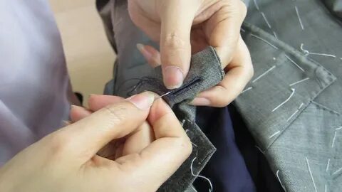 深 圳 制 米 蘭 式 扣 眼 Shenzhen made Milanese buttonhole (tailoring