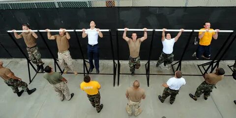 File:US Navy 080710-N-2959L-281 ailors perform pull-ups whil