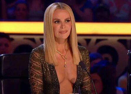 Amanda Holden laughs off discussion of her 'tired old breast