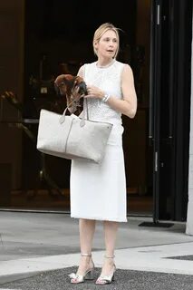KELLY RUTHERFORD Out with Her Dog in Los Angeles 09/25/2017 