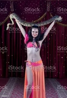 Portrait Of Female Snake Charmer Holding Python Stok Fotoğra