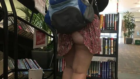 Accidental teen upskirt at public library.