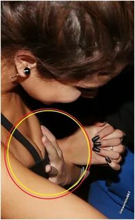 selena gomez hand palpating 2013 - Selena Gomez Photo (35597