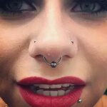Sale double nostril piercing and septum is stock