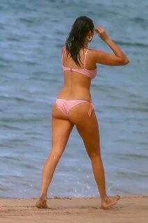 nina dobrev looks amazing in a pink polka dot bikini while e